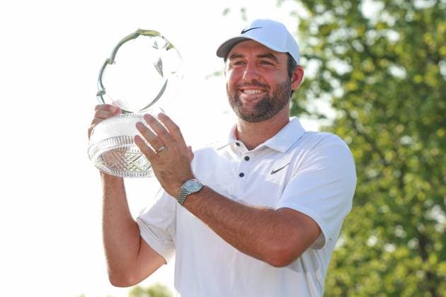 Memorial Tournament presented by Workday Scottie Scheffler of Dallas, Texas lifts up the trophy after his back-to-back win during the final round of the Memorial Tournament presented by Workday at Muirfield Village Golf Club on Sunday, June 1, 2025 in Dublin, Ohio. Dublin Ohio United States  Copyright: xAmyxLemusx originalFilename:lemus-memorial250601_npVlk.jpg