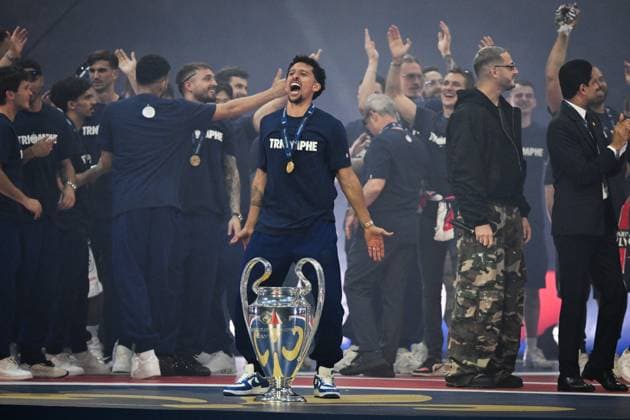 PSG celebrates Champions League trophy at Parc des Princes - FA Paris Saint-Germain’s defender Marquinhos reacts as Paris Saint-Germain’s players celebrate the UEFA Champions League trophy at the Parc des Princes Stadium in Paris on June 1, 2025, the day after PSG won the UEFA Champions League final football match over Inter Milan in Munich, on May 31, 2025. Photo by Firas Abdullah ABACAPRESS.COM Paris Ile-de-France France  Copyright: xAbdullahxFiras ABACAx