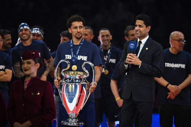 PSG celebrates Champions League trophy at Parc des Princes - FA President of Paris Saint-Germain Nasser Al-Khelaifi stands next to Paris Saint-Germain’s defender Marquinhos as Paris Saint-Germain’s players celebrate the UEFA Champions League trophy at the Parc des Princes Stadium in Paris on June 1, 2025, the day after PSG won the UEFA Champions League final football match over Inter Milan in Munich, on May 31, 2025. Photo by Firas Abdullah ABACAPRESS.COM Paris Ile-de-France France  Copyright: xAbdullahxFiras ABACAx