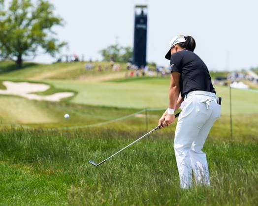 June 1, 2025, Erin, Wi, USA: RUONING YIN of China hits an iron shot from the rough on the fifth hole during the final round round of the 2025 LPGA, Golf Damen U.S. Womens Open at Erin Hills Golf Course in Erin, Wis. Erin USA - ZUMAb262 20250601_znp_b262_010 Copyright: xJeffxM.xBrownx