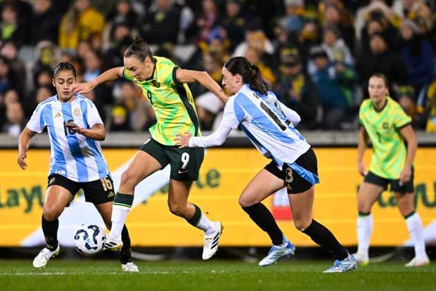 SOCCER AUSTRALIA ARGENTINA, Caitlin Foord of Australia is tackled by Sophia Braun of Argentina during the Women s friendly international soccer match between Australia and Argentina at GIO Stadium in Canberra, Monday, June 2, 2025. ( NO ARCHIVING, EDITORIAL USE ONLY CANBERRA AUSTRALIAN CAPITAL TERRITORY AUSTRALIA  Copyright: xLUKASxCOCHx 20250602116614725463