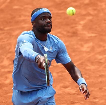 (250604) -- PARIS, June 4, 2025 -- Frances Tiafoe returns a shot during the men s singles quarterfinal match between Lorenzo Musetti of Italy and Frances Tiafoe of the United States at the French Open tennis tournament at Roland Garros, Paris, France, June 3, 2025. ) (SP)FRANCE-PARIS-TENNIS-FRENCH OPEN-MEN S SINGLES-QUARTERFINAL LixJing 