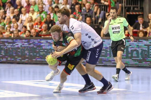 04.06.2025, xgox, Handball - Daikin HBL, SC Magdeburg - SG Flensburg-Handewitt emspor, v.l. Philipp Weber (Magdeburg, 20) , Johannes Golla (Flensburg, 4) Zweikampf, Duell, Kampf, tackle Magdeburg