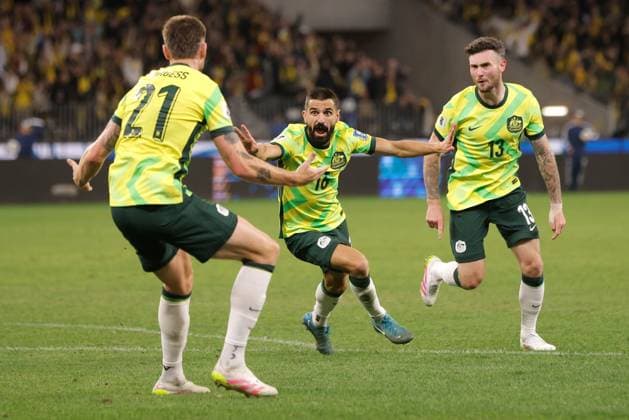 SOCCER AUSTRALIA JAPAN, Aziz Behich of the Socceroos celebrates after scoring a goal during the 2026 FIFA men s World Cup qualifier match between Australia Socceroos and Japan Samurai Blue at Optus Stadium in Perth, Thursday, June 5, 2025. ( NO ARCHIVING, EDITORIAL USE ONLY PERTH WESTERN AUSTRALIA AUSTRALIA  Copyright: xRICHARDxWAINWRIGHTx 20250605135007771210