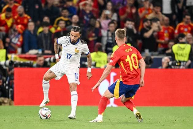 Malo Gusto (France) und Dani Olmo (Spain) battle for the ball during the UEFA Nations League 2025 semifinal match between Spain and France at Stuttgart Arena on June 5, 2025 in Stuttgart, Germany. (Photo by Harry Langer DeFodi Images)