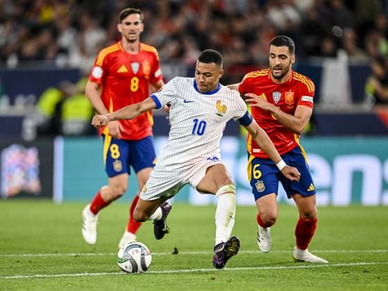 Fabian Ruiz (Spain), Kylian MbappÃ (France) und Mikel Merino (Spain) battle for the ball during the UEFA Nations League 2025 semifinal match between Spain and France at Stuttgart Arena on June 5, 2025 in Stuttgart, Germany. (Photo by Harry Langer DeFodi Images)