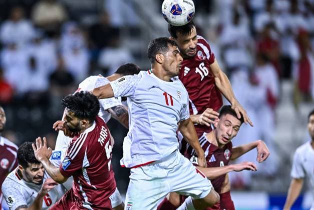 Sport Themen der Woche KW23 Sport Bilder des Tages Sport Bilder des Tages 2026 FIFA World Cup, WM, Weltmeisterschaft, Fussball Qualifier -Qatar v Iran Boualem Khoukhi ( 16) of Qatar and Ali Nemati of Iran in action during the FIFA World Cup 2026 AFC Asian Qualifiers group A third round match between Qatar and Iran at Jassim Bin Hamad Stadium in Doha, Qatar, on June 5, 2025 DOHA Qatar Copyright: xNOUSHADx