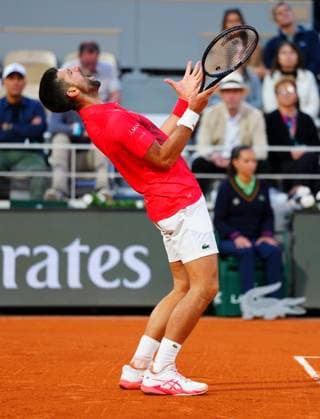 A frustrated Novak Djokovic shouts French Open Tennis, Day Thirteen, Tennis, Roland Garros, Paris, France - 06 Jun 2025 EDITORIAL USE ONLY No use with unauthorised audio, video, data, fixture lists, club league logos or live services. Online in-match use limited to 120 images, no video emulation. No use in betting, games or single club league player publications. Copyright: xJavierxGarcia Shutterstockx 15338000bm