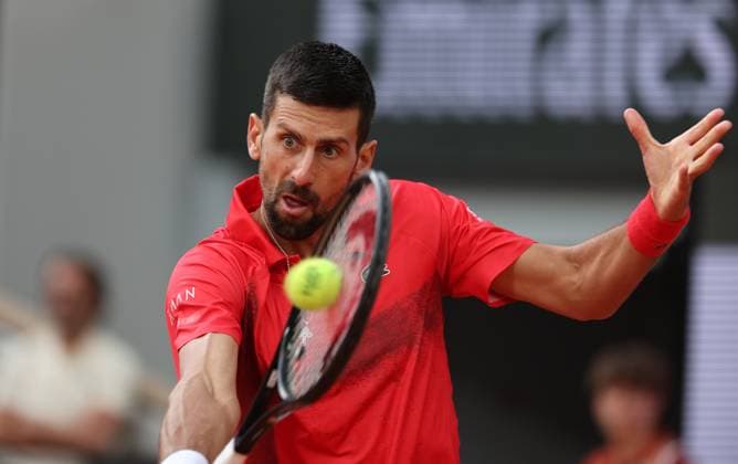 Serb Novak Djokovic plays against top-seeded Jannik Sinner of Italy during their semi-final match at the French Tennis Open in Roland Garros in Paris, France, on Friday, June 6, 2025. Sinner won 6-4, 7-5, 7-6 and advanced to the final.  PAR20250607238 MAYAxVIDON-WHITE