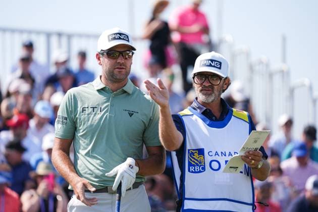 RBC Canadian Open 2025 - Round Three CALEDON, CANADA - JUNE 7 : Corey Conners of Canada talks with his caddie Danny Sahl before playing his shot from the 1st tee during the third round of the RBC Canadian Open 2025 at TPC Toronto at Osprey Valley in Caledon, Ontario, Canada on June 7, 2025. Mert Alper Dervis Anadolu Ontario Canada. Editorial use only. Please get in touch for any other usage.  Copyright: x2025xAnadoluxMertxAlperxDervisx