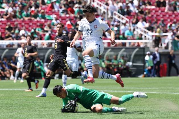 Salt Lake City, USA, June 7th 2025: Raul Rangel (12 Mexico) covers the ball against Fabian Rieder (22 Switzerland) during the International Friendly, Länderspiel, Nationalmannschaft football match between Mexico and Switzerland at Rice-Eccles Stadium in Salt Lake City, USA. (Rob Gray SPP) Copyright: xRobxGrayx xSPPx spp-en-RoGrSp-ROB_5609
