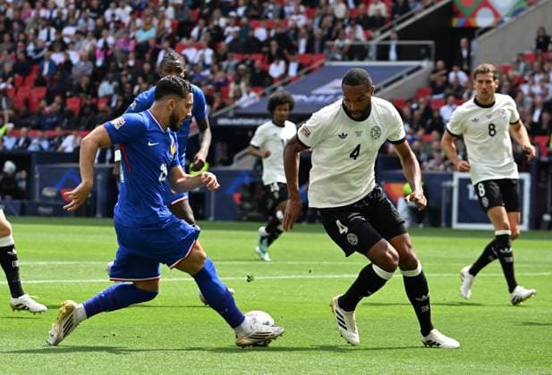 08.06.2025, xsltx, Fussball UEFA Nations League Platz 3, Deutschland - Frankreich v.l. Rayan Cherki (Frankreich), Jonathan Tah (Deutsche Fussball Nationalmannschaft DFB) (DFL DFB REGULATIONS PROHIBIT ANY USE OF PHOTOGRAPHS as IMAGE SEQUENCES and or QUASI-VIDEO) Stuttgart