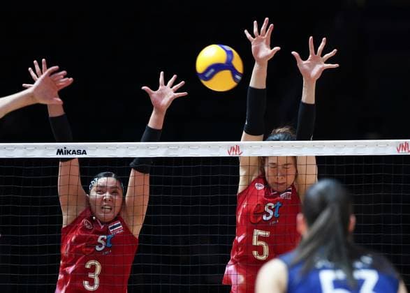 (250608) -- BEIJING, June 8, 2025 -- Thailand s Pornpun Guedpard (L) and Thatdao Nuekjang block the ball during the Pool 3 match between France and Thailand at the Women s Volleyball Nations League (VNL) 2025 at the National Indoor Stadium in Beijing, China, June 8, 2025. ) (SP)CHINA-BEIJING-VOLLEYBALL-VNL-FRANCE VS THAILAND (CN) LuoxYuan 