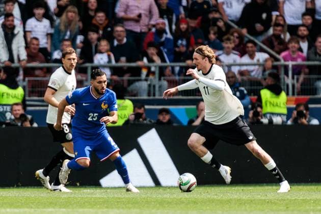 UEFA Nations League Finals: Deutschland - Frankreich; 08.06.2025 Zweikampf Rayan Cherki (Frankreich, 25), Nick Woltemade (Deutschland, 11) UEFA Nations League Finals: Spiel um Platz 3 Deutschland - Frankreich; Stuttgart, Arena Stuttgart am 08.06.2025 Copyright: xBEAUTIFULxSPORTS Wunderlx