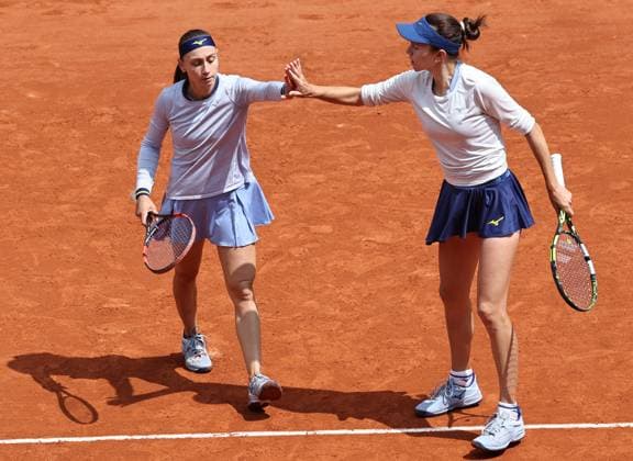 (250608) -- PARIS, June 8, 2025 -- Anna Danilina (R) Aleksandra Krunic react during the women s doubles final between Anna Danilina of Kazakstan Aleksandra Krunic of Serbia and Sara Errani Jasmine Paolini of Italy at the French Open tennis tournament at Roland Garros, Paris, France, June 8, 2025. ) (SP)FRANCE-PARIS-TENNIS-FRENCH OPEN-WOMEN S DOUBLES-FINAL LixJing 