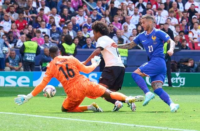 Karim Adeyemi, DFB 14 fake foul against Mike Maignan 16 of France goalkeeper, schwalbe in the UEFA Nations League 2025 Third Place match GERMANY - FRANCE in Season 2024 2025 at June 8, 2025 in Stuttgart, Germany.