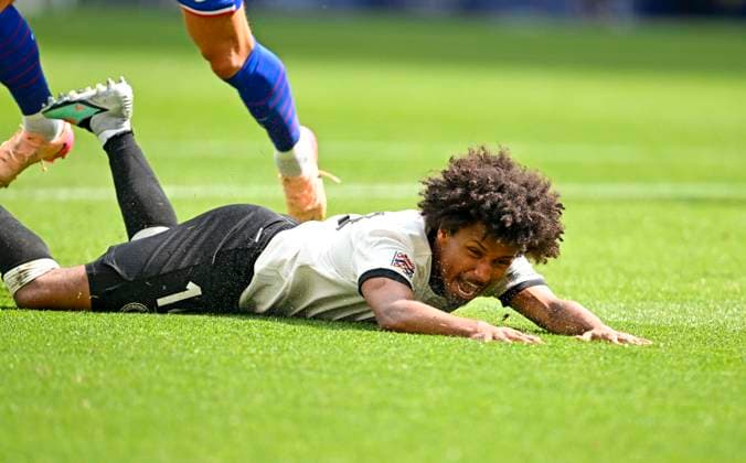 08.06.2025, Fussball UEFA Nations League 2024 25, Spiel um Platz 3, Deutschland - Frankreich, in der MHP-Arena Stuttgart, Karim Adeyemi (Deutschland) am Boden