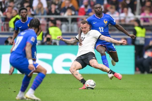 Fußball, Nations League, 20250608, Deutschland - Frankreich. Im Bild v.l. David RAUM (Deutschland, 22), Randal KOLO MUANI (Frankreich, 12). Stuttgart Stuttgart Arena Baden Württemberg Deutschland Copyright: Passion2Press MarkusxFischerx