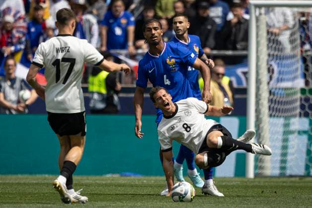 FOOTBALL : The UEFA Nations League third place play-off football match between Germany and France in Stuttgart, southwestern Germany on June 8, 2025. LoÃ¯c BadÃ 4 et Leon Goretzka 8  Copyright: xelyxandroxcegarrax