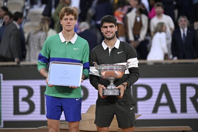 2025 Roland-Garros - Men s Single Final PARIS, FRANCE - JUNE 08: Winner Spain s Carlos Alcaraz (R) poses with the trophy next to Italy s Jannik Sinner at the end of their men s singles final match on day 15 of the French Open tennis tournament on Court Philippe-Chatrier at the Roland-Garros Complex in Paris on June 8, 2025. Burak Akbulut Anadolu Paris France. Editorial use only. Please get in touch for any other usage.  Copyright: x2025xAnadoluxBurakxAkbulutx