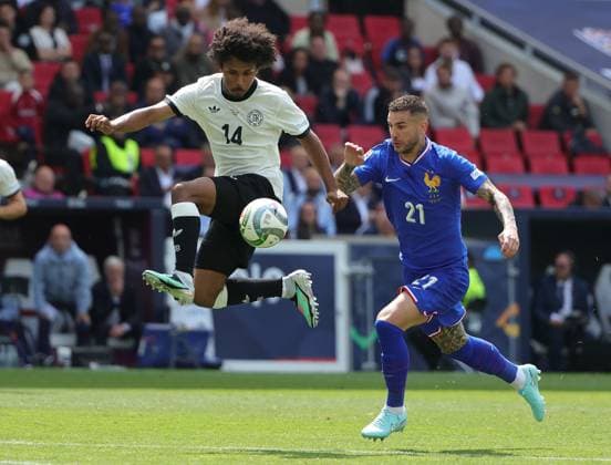 (250609) -- STUTTGART, June 9, 2025 -- Karim Adeyemi (L) of Germany vies with Lucas Hernandez of France during the UEFA Nations League A third-place match between Germany and France in Stuttgart, Germany, June 8, 2025. (Photo by Xinhua) (SP)GERMANY-STUTTGART-FOOTBALL-UEFA NATIONS LEAGUE-GERMANY VS FRANCE PhilippexRuiz 