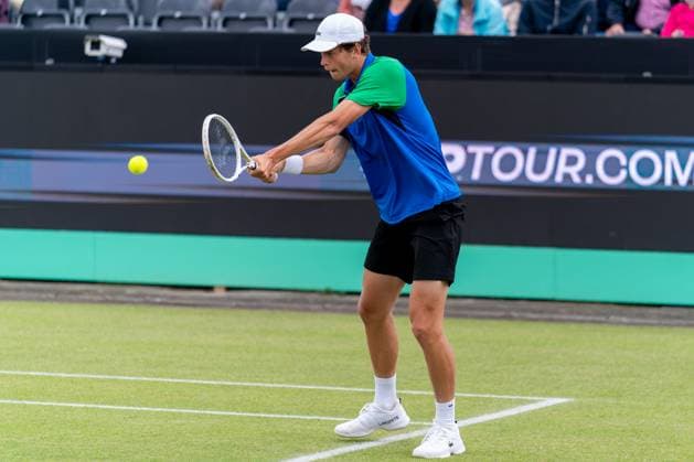 2025-06-10 2025 Libema Open Grass Court Championships ROSMALEN, NETHERLANDS - JUNE 10: Alexander Blockx of Belgium in action during Day Two of 2025 Libema Open Grass Court Championships at Autotron on June 10, 2025 in Rosmalen, Netherlands. Rosmalen Autotron Netherlands Content not available for redistribution in The Netherlands directly or indirectly through any third parties. Copyright: xJorisxVerwijstx
