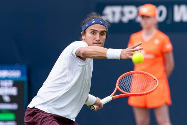 2025-06-10 2025 Libema Open Grass Court Championships ROSMALEN, NETHERLANDS - JUNE 10: Mattia Bellucci of Italy in action during Day Two of 2025 Libema Open Grass Court Championships at Autotron on June 10, 2025 in Rosmalen, Netherlands. Rosmalen Autotron Netherlands Content not available for redistribution in The Netherlands directly or indirectly through any third parties. Copyright: xJorisxVerwijstx