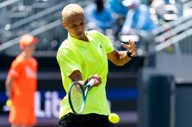 2025-06-11 2025 Libema Open Grass Court Championships ROSMALEN, NETHERLANDS - JUNE 11: Gabriel Diallo of Canada in action during Day Three of 2025 Libema Open Grass Court Championships at Autotron on June 11, 2025 in Rosmalen, Netherlands. Rosmalen Autotron Netherlands Content not available for redistribution in The Netherlands directly or indirectly through any third parties. Copyright: xJorisxVerwijstx