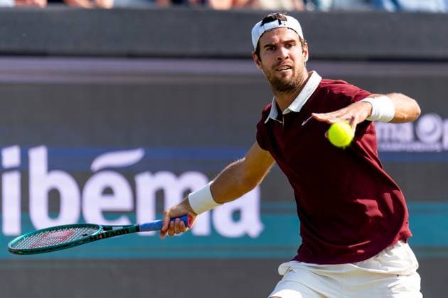 2025-06-11 2025 Libema Open Grass Court Championships ROSMALEN, NETHERLANDS - JUNE 11: Karen Khachanov of Russia in action during Day Three of 2025 Libema Open Grass Court Championships at Autotron on June 11, 2025 in Rosmalen, Netherlands. Rosmalen Autotron Netherlands Content not available for redistribution in The Netherlands directly or indirectly through any third parties. Copyright: xJorisxVerwijstx