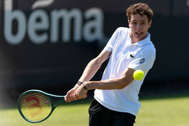 2025-06-12 2025 Libema Open Grass Court Championships ROSMALEN, NETHERLANDS - JUNE 12: Ugo Humbert of France in action during Day Four of 2025 Libema Open Grass Court Championships at Autotron on June 12, 2025 in Rosmalen, Netherlands. Rosmalen Autotron Netherlands Content not available for redistribution in The Netherlands directly or indirectly through any third parties. Copyright: xJorisxVerwijstx