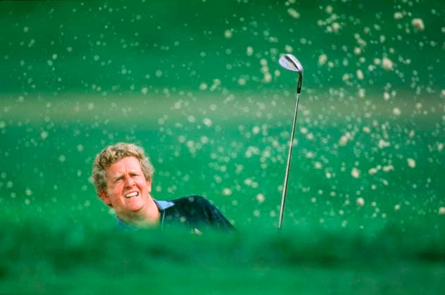 The 1999 Volvo PGA, Golf Herren Championship 990531 WENTWORTH, SURREY, UK PHOTO MARK NEWCOMBE VOLVO PGA CHAMPIONSHIP 1999 COLIN MONTGOMERIE splashes out of the bunker trap as the ball is in the air towards the green The 1888 Volvo PGA Championship was held from May 26 to 29, 1999 at the West Course of Wentworth Club in Virginia Water, Surrey, England. This prestigious European Tour event attracted a competitive field. Copyright: xMarkxNewcombex