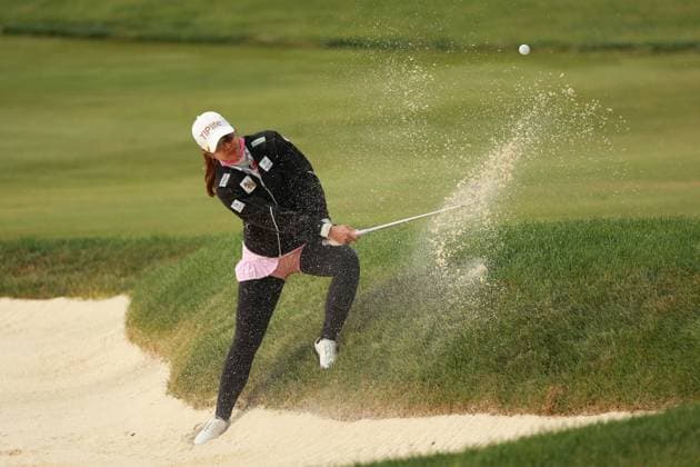 Meijer LPGA, Golf Damen Classic BELMONT, MICHIGAN-JUNE 13: Pornanong Phatlum of Thailand hits out of the bunker toward the 10th green during the second round of the Meijer LPGA Classic for Simply Give golf tournament at Blythefield Country Club in Belmont, MI, USA Friday, June 13, 2025. Belmont Michigan United States  Copyright: xJorgexLemusx originalFilename:lemus-meijerlp250613_npGH1.jpg