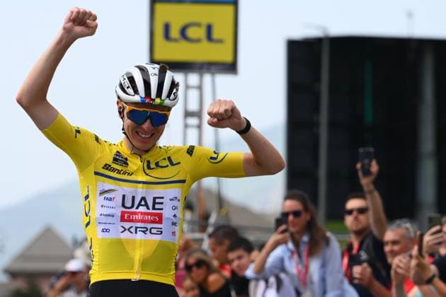 Criterium du Dauphine 2025 Stage 7 VALMEINIER 1800, FRANCE - JUNE 14 : Pogacar Tadej (SLO) of UAE Team Emirates - XRG wins the stage 7 of the 77th edition of Criterium du Dauphine Libere an UCI World Tour 2.UWT cycling road race stage for Men Elite of 131.6 km with start in Grand-Aigueblanche and finish in Valmeinier 1800 on June 14, 2025 in Valmeinier 1800, France, 14 06 2025 ( Motordriver Kenny Verfaillie - Valmeinier 1800 France  Copyright: xVincentxKalutx