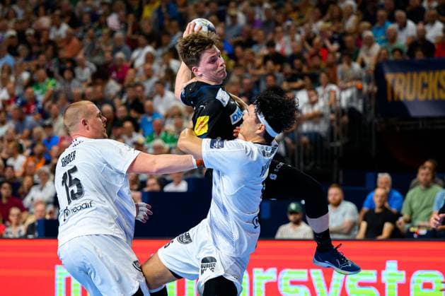 Koeln, Deutschland: Handball EHF CL Final 4 - Halbfinale - Fuechse Berlin - HBC Nantes v.li. Matej Gaber (Nantes), Nils Lichtlein (Berlin), Shuichi Yoshida (Nantes) Koeln Lanxess Arena Nordrhein-Westfalen Deutschland