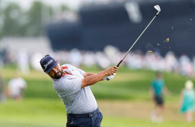 J.J. Spaun hits an approach shot on the 1st hole during the third round of the 125th U.S. Open Golf Championship at Oakmont Country Club in Oakmont, Pennsylvania on Saturiday, June 14, 2025.  PIT20250614605 JOHNxANGELILLO