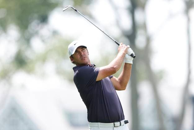 Brooks Koepka hits his approach shot on the 1st hole during the third round of the 125th U.S. Open Golf Championship at Oakmont Country Club in Oakmont, Pennsylvania on Saturiday, June 14, 2025.  PIT20250614610 JOHNxANGELILLO