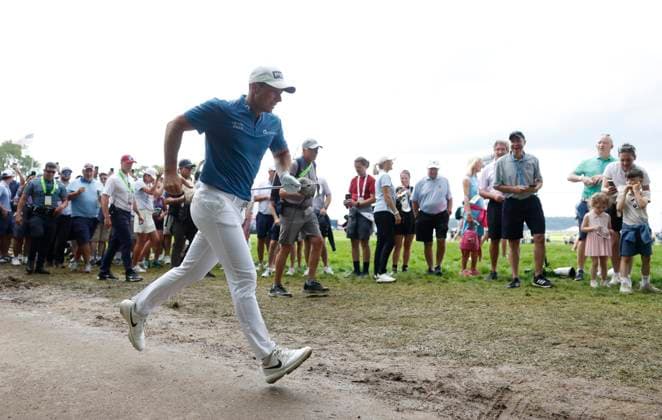 Viktor Hovland of Norway runs to his ball after hitting into the bushes on the 1st hole during the third round of the 125th U.S. Open Golf Championship at Oakmont Country Club in Oakmont, Pennsylvania on Saturiday, June 14, 2025.  PIT20250614618 JOHNxANGELILLO