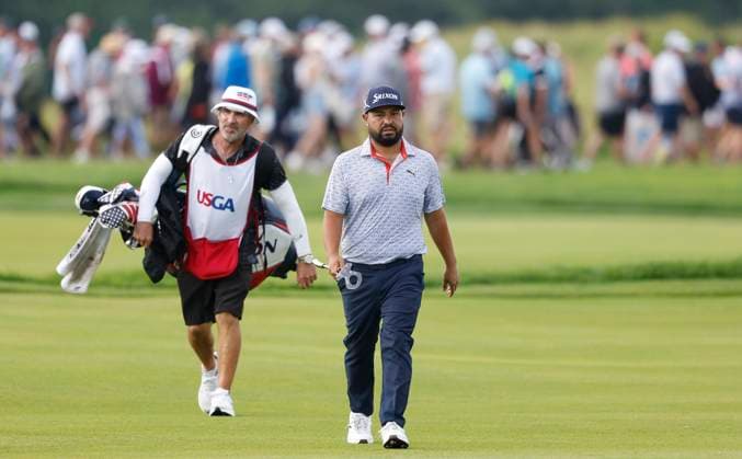 J.J. Spaun walks up to the 9th green with his caddie Mark Carens during the third round of the 125th U.S. Open Golf Championship at Oakmont Country Club in Oakmont, Pennsylvania on Saturiday, June 14, 2025.  PIT20250614634 JOHNxANGELILLO