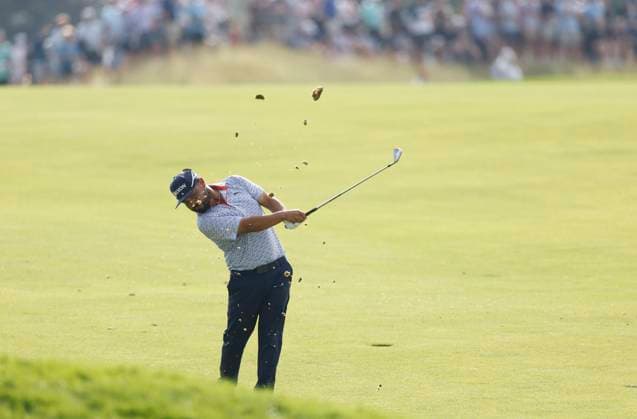 J.J. Spaun hits an approach shot to the 10th hole during the third round of the 125th U.S. Open Golf Championship at Oakmont Country Club in Oakmont, Pennsylvania on Saturiday, June 14, 2025.  PIT20250614649 JOHNxANGELILLO