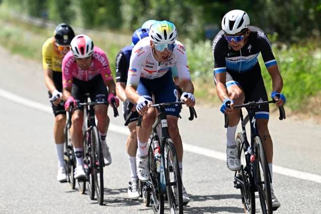 Elfstedenronde 2025 Cycling Race BRUGGE, BELGIUM - JUNE 15 : Verheyen Maarten (BEL) of Baloise Glowi Lions , Leroux Samuel (FRA) of Team TotalEnergies during the 43th edition of Elfstedenronde an UCI Class 1.1 one day cycling road race for Men Elite of 196 km with start in Brugge and finish in Brugge on June 15, 2025 in Brugge, Belgium, 15 06 2025 ( Motordriver Guy De Vuyst - Brugge Belgium  Copyright: xNicoxVereeckenx