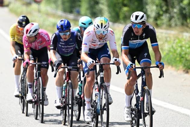 Elfstedenronde 2025 Cycling Race BRUGGE, BELGIUM - JUNE 15 : Verheyen Maarten (BEL) of Baloise Glowi Lions , Leroux Samuel (FRA) of Team TotalEnergies during the 43th edition of Elfstedenronde an UCI Class 1.1 one day cycling road race for Men Elite of 196 km with start in Brugge and finish in Brugge on June 15, 2025 in Brugge, Belgium, 15 06 2025 ( Motordriver Guy De Vuyst - Brugge Belgium  Copyright: xNicoxVereeckenx