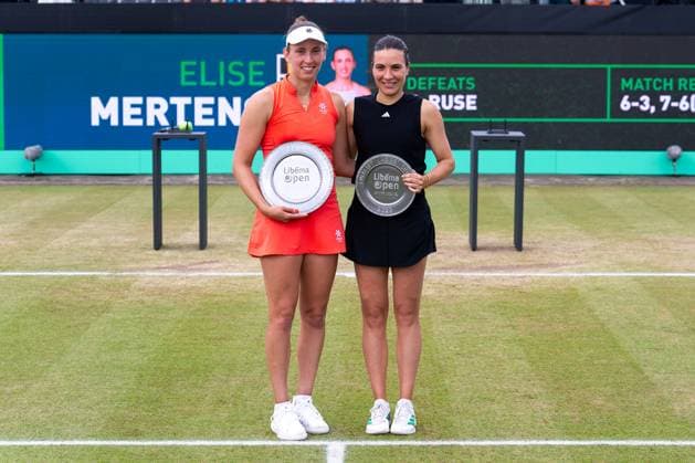 2025-06-15 2025 Libema Open Grass Court Championships ROSMALEN, NETHERLANDS - JUNE 15: Elise Mertens of Belgium and Elena Gabriela Ruse of Romania with their trophy during Day Seven of 2025 Libema Open Grass Court Championships at Autotron on June 15, 2025 in Rosmalen, Netherlands. Rosmalen Autotron Netherlands Content not available for redistribution in The Netherlands directly or indirectly through any third parties. Copyright: xJorisxVerwijstx