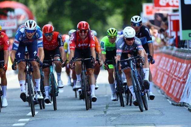 French Paul Magnier of Soudal Quick-Step and Belgian Jasper Philipsen of Alpecin-Deceuninck pictured in action during the Elfstedenronde one day cycling race, race 4 (out of 8) of the Lotto Belgium Cup, 196 km with start and finish in Brugge, Sunday 15 June 2025. DAVIDxPINTENS  x127046734x