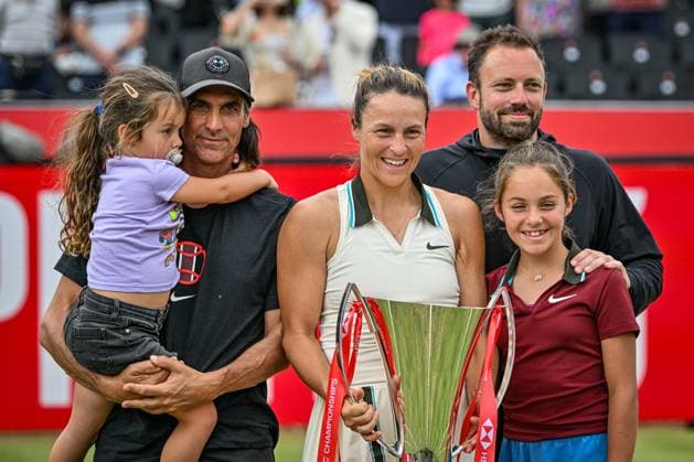 15th June 2025; HSBC Championships, Queens Club, West Kensington, London, England: HSBC Womens Championships Queens Club, Day 7; Tatjana Maria (GER) celebrates with her coach and family by lifting the new women s trophy after 15th June 2025; HSBC Championships, Queens Club, West Kensington, London, England: HSBC Womens Championships Queens Club, Day 7; Tatjana Maria (GER) celebrates by lifting the new women s trophy after winning the womens singles final against Amanda Anisimova (USA) ActionPlus12801500 GodfreyxPitt