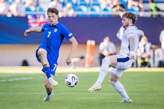 ENGLAND U21, U 21 - SLOVENIA U21 Harvey Elliott of England and Tjas Begic of Slovenia during the UEFA European Under-21 Championship 2025 Group B football match between England U21 and Slovenia U21. Stadium Nitra Arena, Nitra, Slovakia, June 15, 2025. Photo by Branislav Racko Copyright: xx 080A3335
