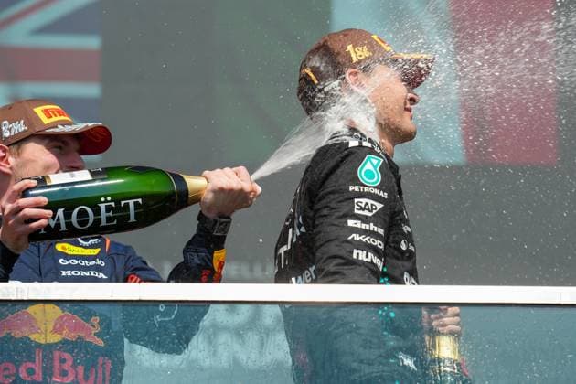 Max Verstappen (NED), Oracle Red Bull Racing, 1 sprays George Russell (GBR), Mercedes-AMG Petronas F1 Team, 63, with champagne after Russel wins the race and Verstappen finished second during Pirelli Grand Prix du Canada 2025, Formula 1 Championship in Montreal, Canada, June 15 2025  Copyright: xScottxColeman IPAxSportx xipa-agency.netx xx IPA_59107711 IPA_Agency_IPA59107711