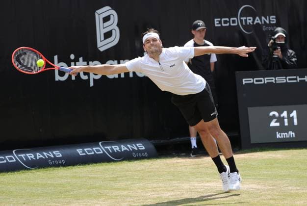 (250616) -- STUTTGART, June 16, 2025 -- Taylor Fritz of the United States hits a return during the men s singles final between Alexander Zverev of Germany and Taylor Fritz of the United States at the Stuttgart Open 2025 tennis tournament in Stuttgart, Germany, June 15, 2025. (Photo by Xinhua) (SP)GERMANY-STUTTGART-TENNIS-STUTTGART OPEN-FINAL PhilippexRuiz 