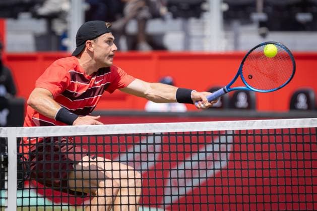 17th June 2025; HSBC Championships, Queens Club, West Kensington, London, England: HSBC Mens Championships Queens Club, Day 2; Jack Draper (GBR) plays a net drop shot against Jenson Brooksby (USA)  ActionPlus12802032 IanxStephen