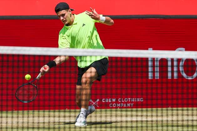 18th June 2025; HSBC Championships, Queens Club, West Kensington, London, England: HSBC Mens Championships Queens Club, Day 3; Jakub Mensik (CZE) plays a forehand shot against Roberto Bautista Agut (ESP)  ActionPlus12802234 HenningxVonxJagow
