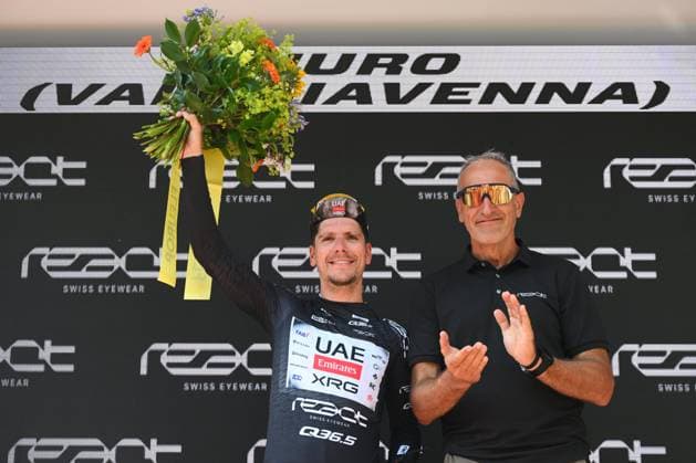 Tour de Suisse 2025 Stage 4 PIURO VALCHIAVENNA, ITALY - JUNE 18 : Almeida Joao (POR) of UAE Team Emirates - XRG during the podium ceremony after the stage 4 of the 88th edition of Tour de Suisse an UCI World Tour 2.UWT cycling road race stage for Men Elite of 193.2 km with start in Heiden and finish in Piuro Valchiavenna on June 18, 2025 in Piuro Valchiavenna, Italy, 18 06 2025 ( Motordriver Kenny Verfaillie - Piuro Valchiavenna Italy  Copyright: xVincentxKalutx